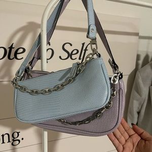 Blue and purple shoulder bags